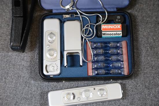 A Minox minocolour cased camera and another Minox miniature camera